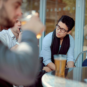 Students having a drink at a bar