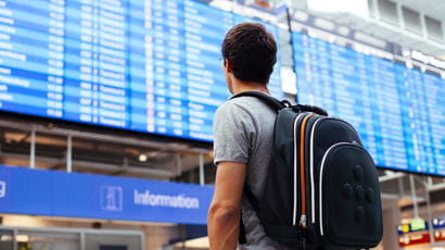 student at airport about to depart on his year abroad