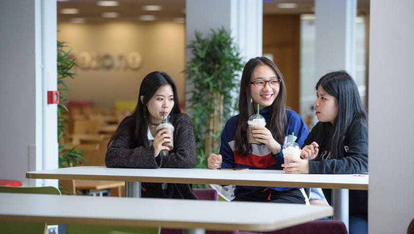 Students sitting in the OneZone cafe