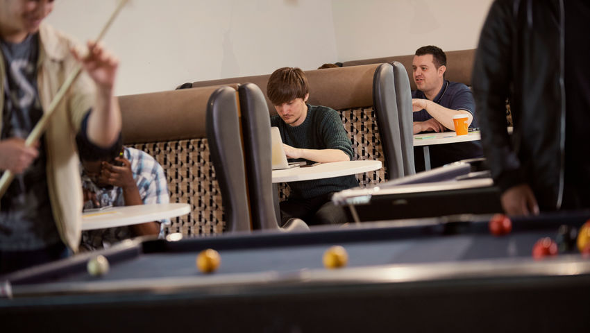 Students playing pool in the Students' Union bar