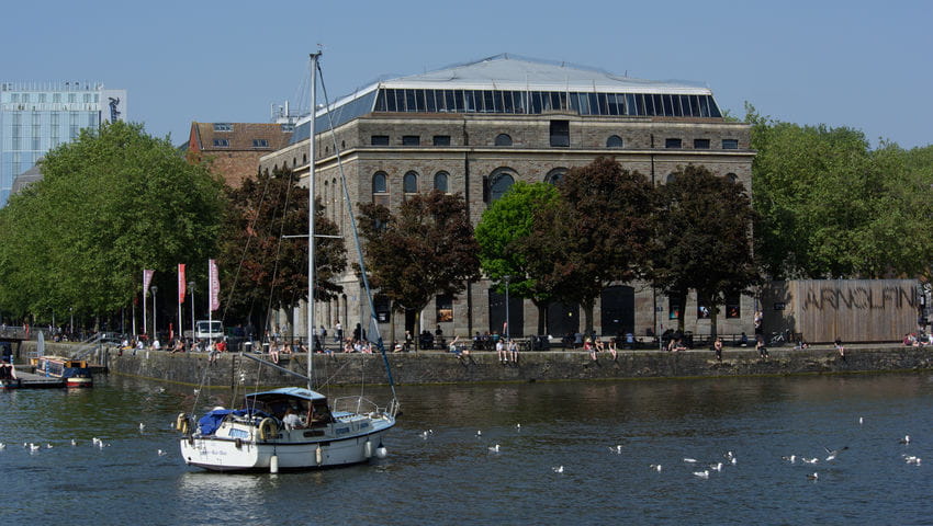 The Arnolfini building across the water with boats