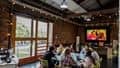 Student sat around a table at the Watershed