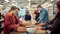 Students working with clay