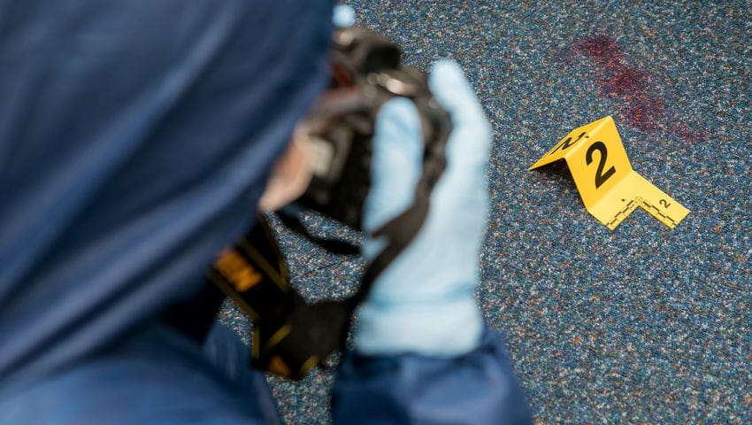 Forensic Science Students inside the UWE Bristol simulation Crime Scene House.