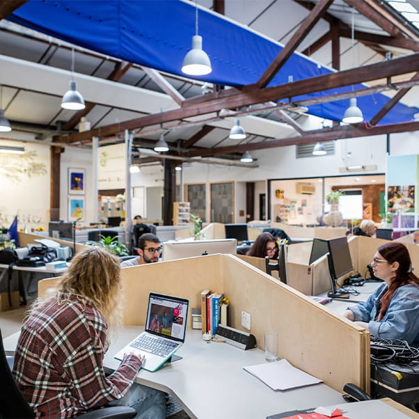 A group of students at desks studying