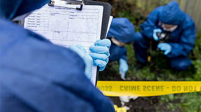 Crime scene house bathroom with students