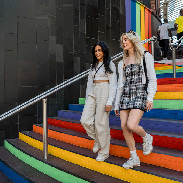 Two female students shopping in Cabot Circus in the centre of Bristol.
