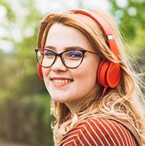 Woman with headphones smiling