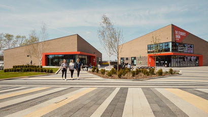 Students walking around Frenchay campus