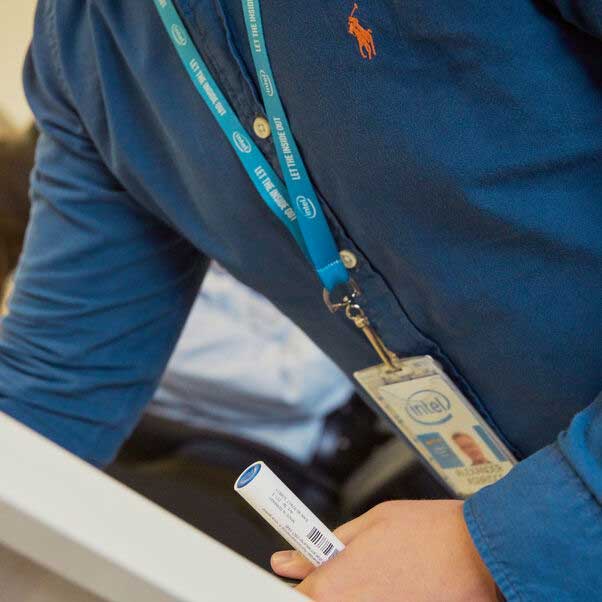 Close up of a placement student's torso with Intel lanyard.