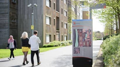 Students walking around Frenchay campus
