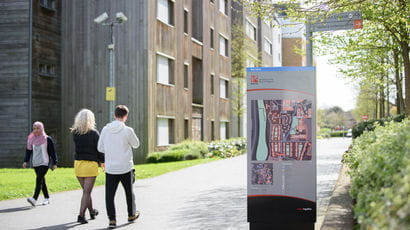 Students walking around Frenchay campus