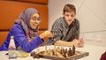 Students playing chess