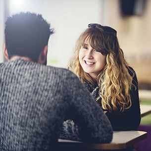 Two students talking to each other