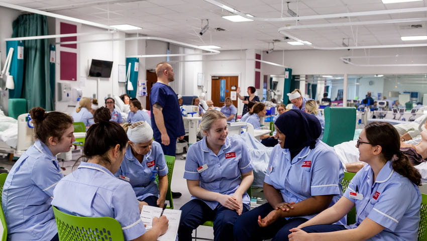 A group of Adult Nursing students in the Skills Simulation Suite on Glenside Campus.