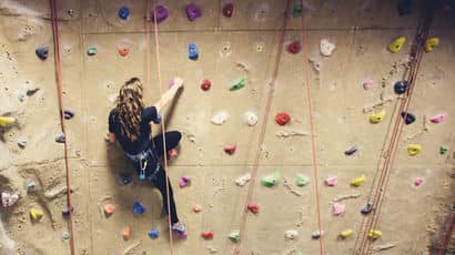 The climbing wall at the Centre for Sport in use.