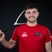 UWE Bristol Performance Sport athlete Jack holding a squash racquet. 