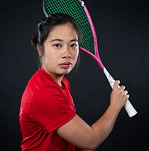 UWE Bristol Performance Sport athlete Wai holding a squash racquet.