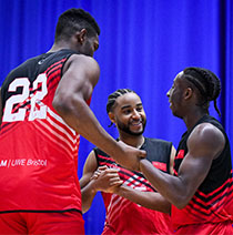 UWE Jets team mates congratulating one of their team on court. 