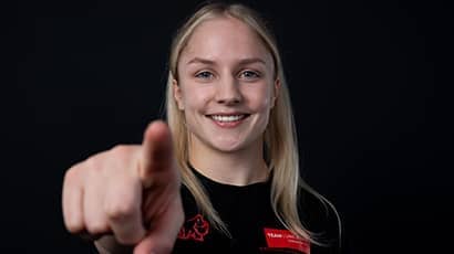 UWE Performance Sport athlete Tatum pointing close to the camera lens.