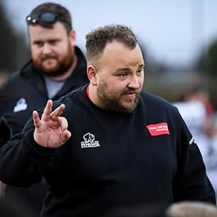 UWE Bristol Performance Sport American Football coach Dan Maher motioning during a training session.