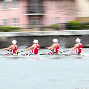 Students competing in a boat race.