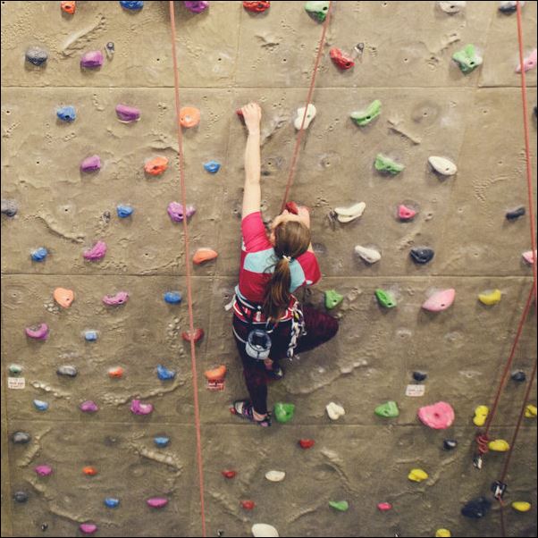 The climbing wall at the Centre for Sport in use.