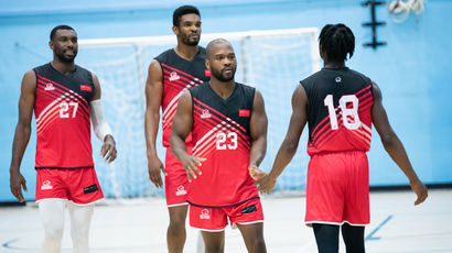 Group of performance sport basketball players.