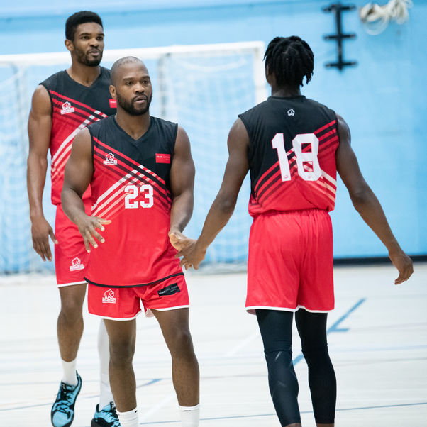 Group of performance sport basketball players.