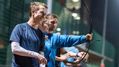 Students playing archery