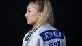 UWE Bristol and GB Judo athlete Tatum Keen turning to camera in her judo outfit.
