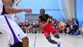 UWE Jets basketball player dribbling at speed across the court. 