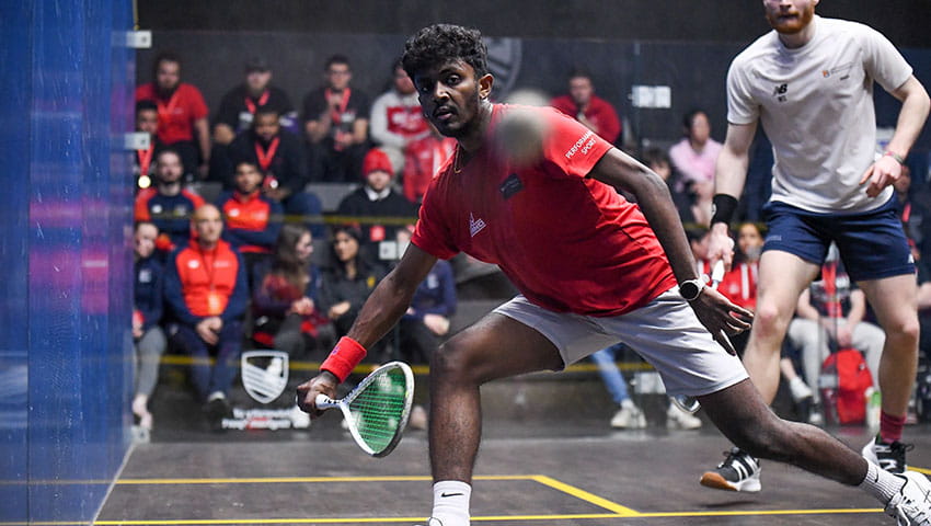 UWE Performance Sport squash player lunging for the ball. 