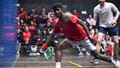 UWE Performance Sport squash player lunging for the ball. 