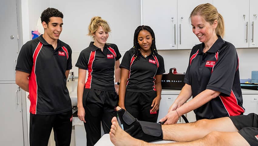 Sport Rehabilitation student treating foot injury