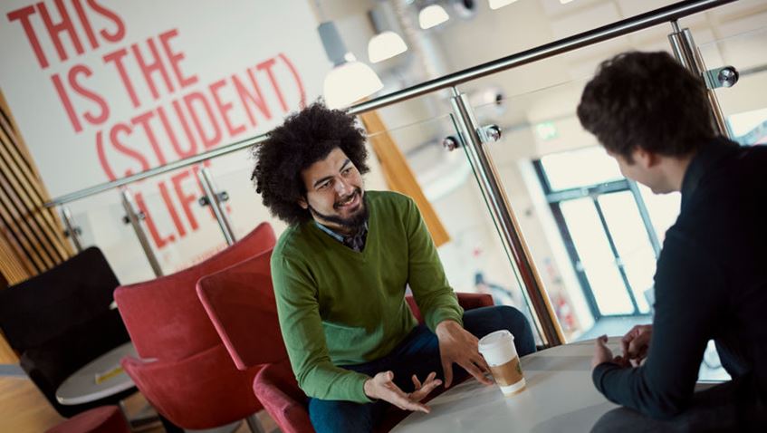 Close of up of students in the Student Union