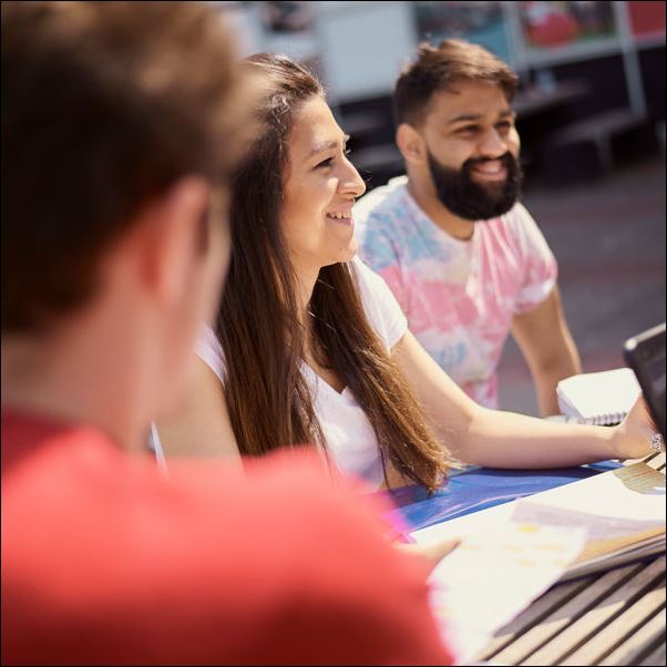 students chatting at a summer school