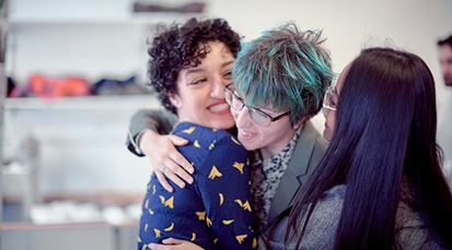 Friends embracing