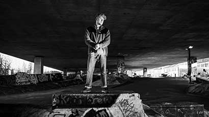 James Tombling profile image in black and white captured at the M32 skate park in Bristol