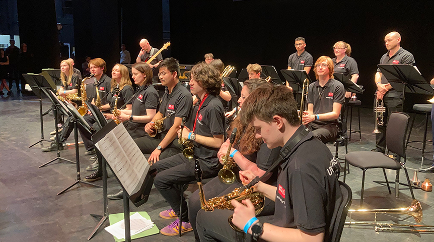UWE Big Band students seated on stage