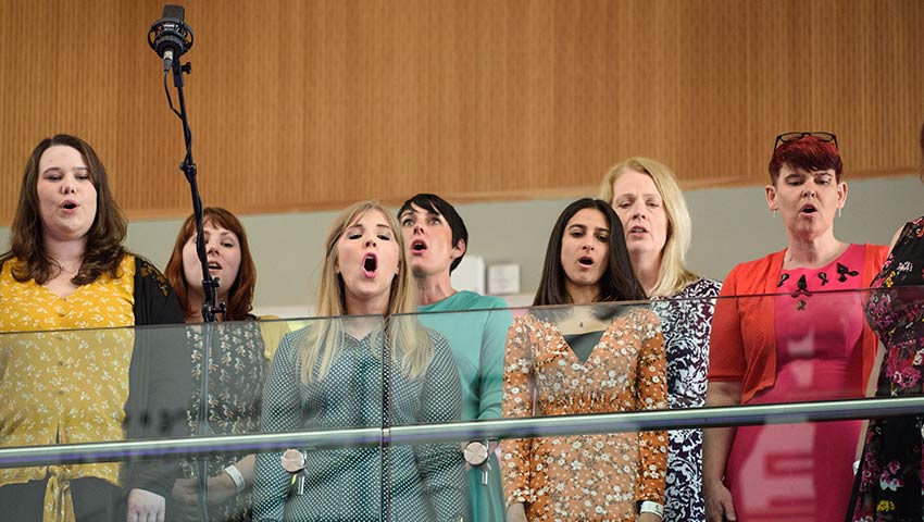 The Technicolour choir performing.