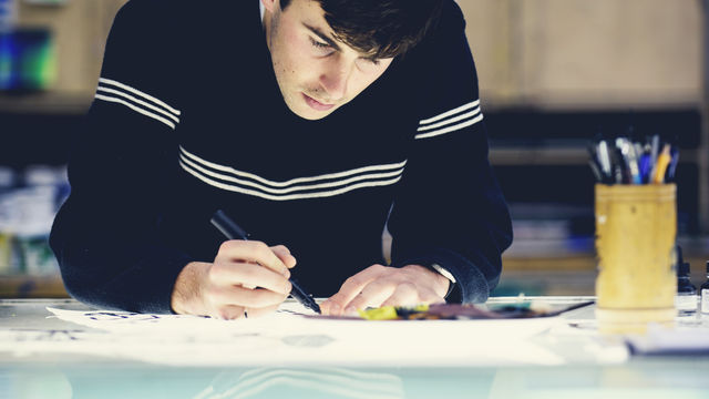 Art student using equipment and facilities