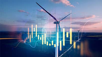 A panoramic view of countryside fields with a wind turbine in the foreground, overlayed with a digital graph, numerical figures and a bar chart. 