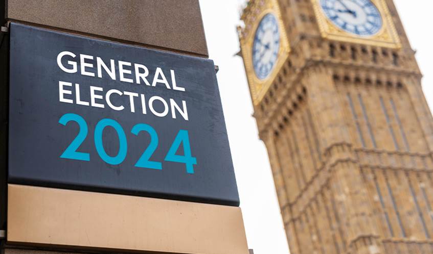 A photo of a sign which says general election 2024 with Big Ben in the background