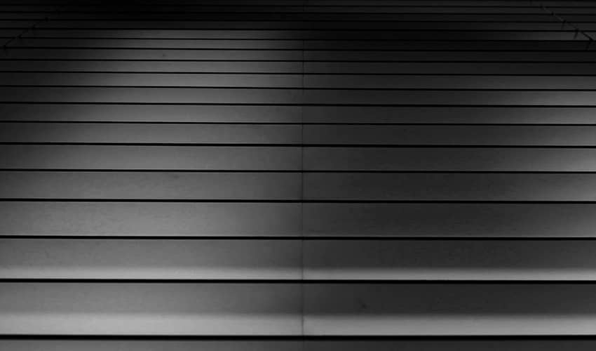 A black and white photo of a staircase. 