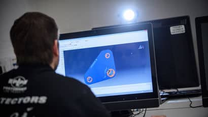 Computing student working at a PC