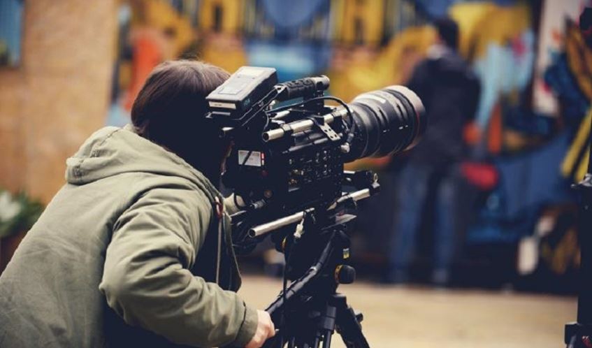 Person operating a film camera