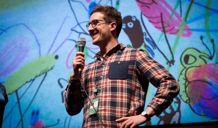 Jack Bennett speaking on a stage