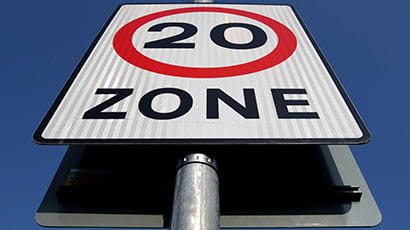 20 miles per hour speed road sign