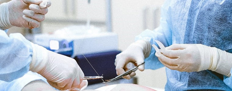 Surgeons performing heart surgery.